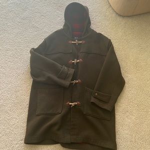 Green wool blend hooded coat. Houndstooth buttons. Red and black plaid interior.